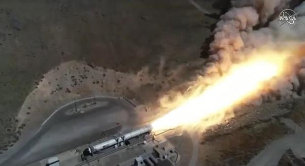 Solid fuel booster for NASA's new moon rocket test fired in Utah
