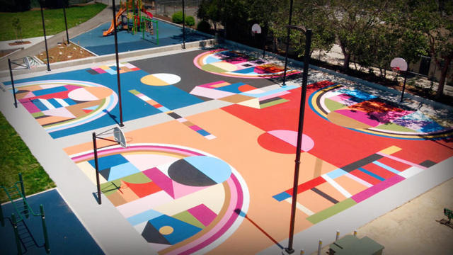 Basketball courts with colorful murals inspire communities